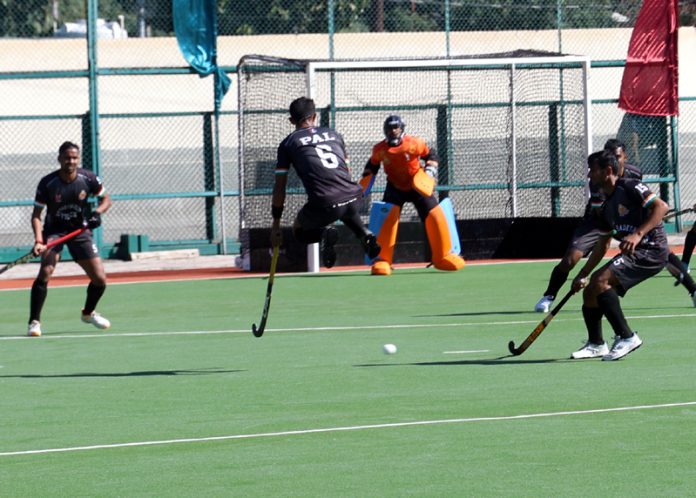 Hockey players in action during a match on Friday at Jammu. -Excelsior/Rakesh
