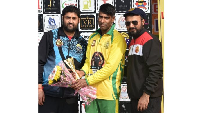 A player receiving trophy for outstanding performance in a match.