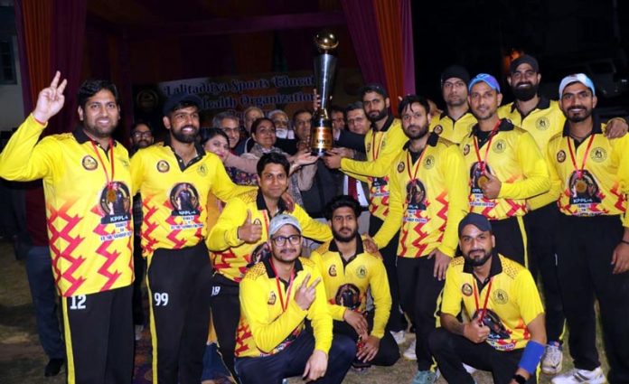 Winning team posing alongwith dignitaries after receiving trophy from chief guest on Thursday.