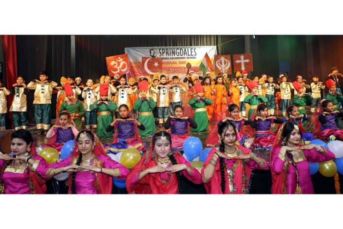 Students of Springdales Higher Secondary School Jammu presenting cultural items during the Annual Day event on Monday.
