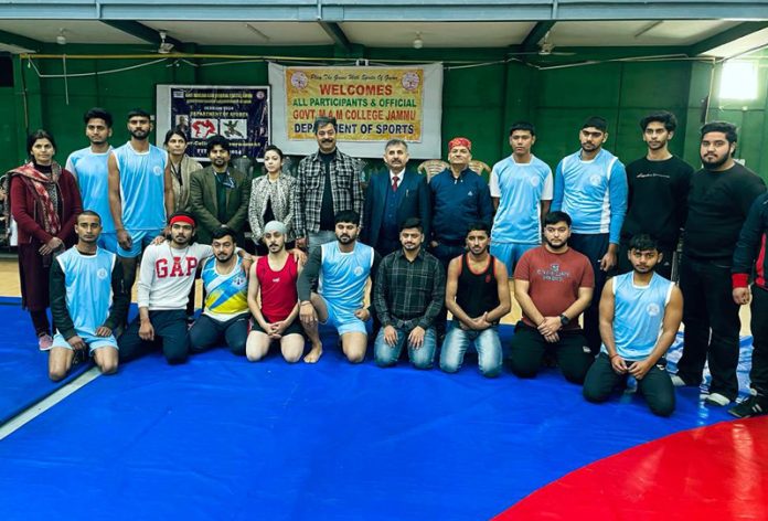 Players posing with dignitaries during Inter College Grappling (Men) championship on Friday. 
