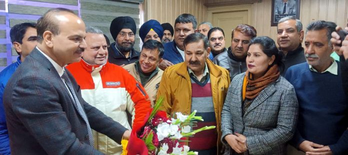 JKMEF members presenting a bouquet to Director Health Services Jammu Dr Rakesh Magotra.