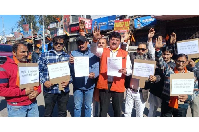 Shiv Sena workers raising slogans during a protest demonstration at Jammu on Friday.