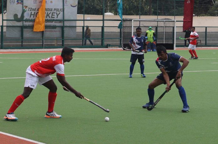 Hockey players in action during ongoing 72nd All India Police Hockey Championship at Jammu on Thursday. — Excelsior/Rakesh