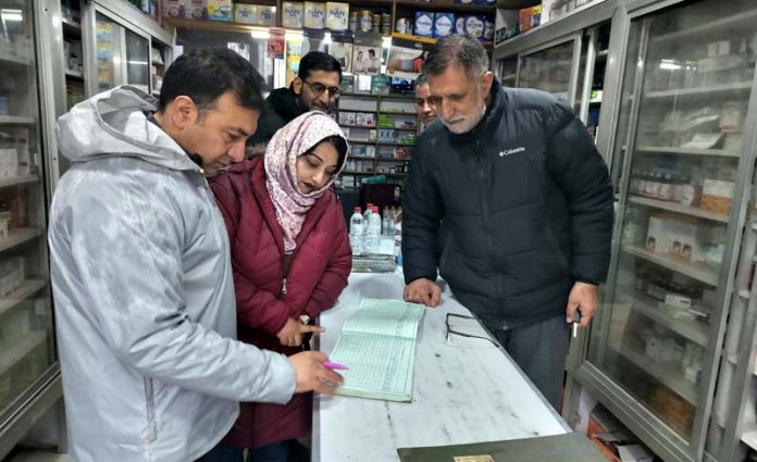 DFCO team during inspection at chemist shop in Baramulla.