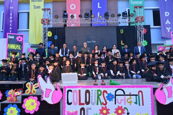 Senior BJP leader, Sham Lal Sharma posing along with students during the Annual Day event on Friday.