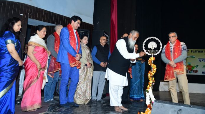 Dignitary lighting lamp during School Annual day event at Jammu.  