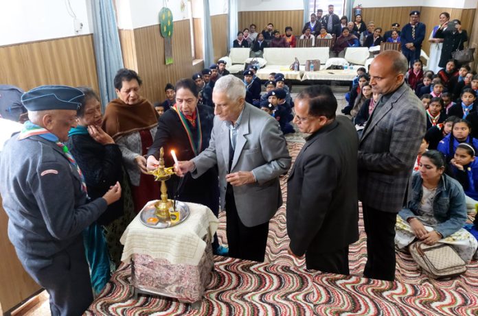 Chief Guest along with dignitaries lighting lamp during a programme at Jammu on Thursday.