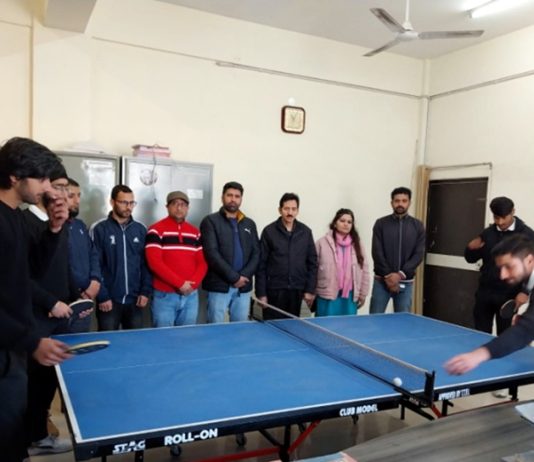 Players in action during a table tennis match at Government Degree College Nowshera.