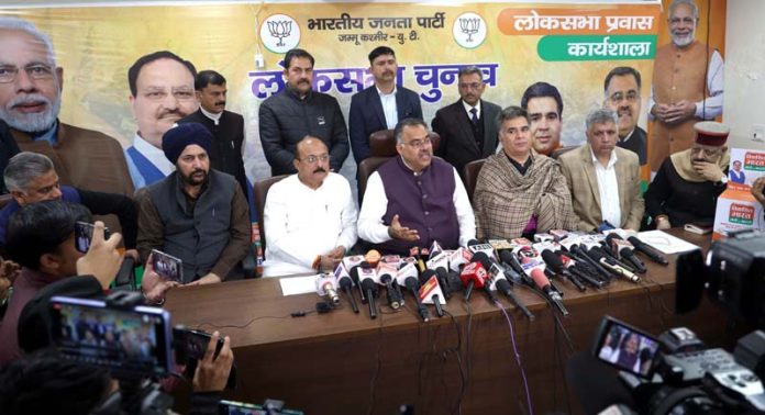 BJP, national general secretary, Tarun Chugh flanked by senior party leaders addressing a press conference at Jammu on Tuesday. -Excelsior/Rakesh