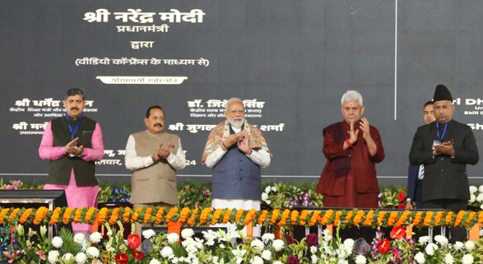 Prime Minister Narendra Modi inaugurates multiple projects from MA Stadium in Jammu on Tuesday. —Excelsior/Rakesh