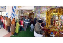 Devotees offering prayer at Guru Ravi Dass Ji Temple at Krishna Nagar in Jammu on Saturday. -Excelsior/Rakesh