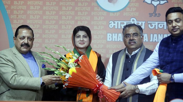 Former MLC and ex NC leader Dr Shehnaz Ganai being welcomed in BJP by party national general secretary , Tarun Chugh, Union Minister, Dr Jitendra Singh and party national spokesperson, Zafar Islam at New Delhi on Monday.