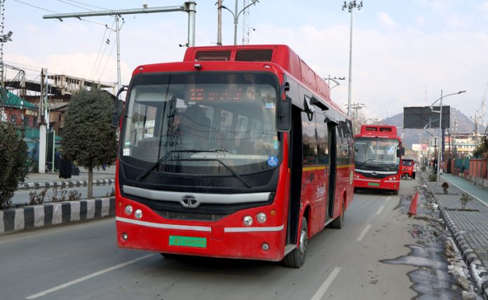 Smart buses back on road after brief halt in Srinagar on Monday. — Excelsior/Shakeel