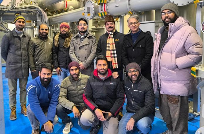 Officials of POWERGRID after successful charging of 220/33kV GIS Harwan in Srinagar on Monday.