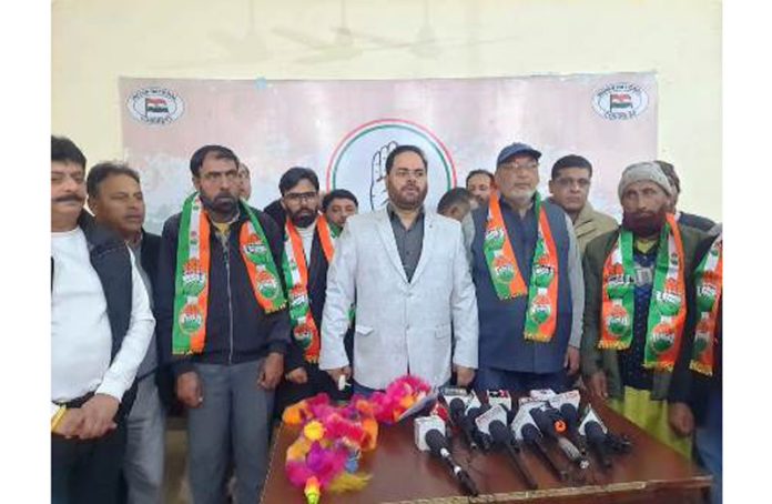 JKPCC president with new entrants in the party at Congress Headquarters in Jammu.