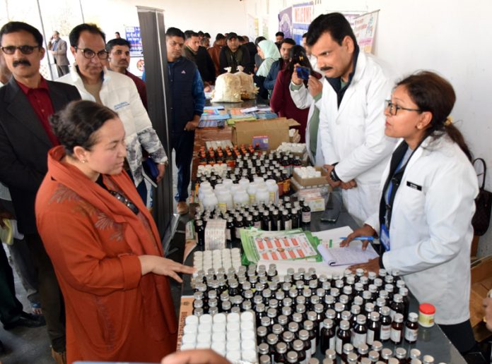 Secretary Information Rehana Batul inspecting a stall during public darbar on Tuesday.