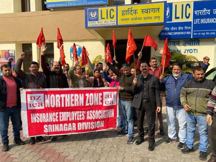LIC employees raising slogans during a protest at Jammu on Friday.