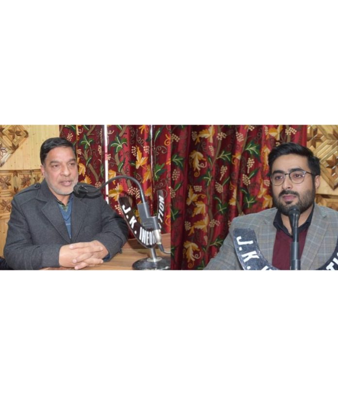 Chairman DDC Nazir Ahmad Khan along with DC Budgam Akshay Labroo addressing the participants during an event.