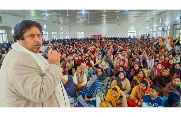 Senior Cong leader, Raman Bhalla addressing public meeting in R S Pura on Sunday.