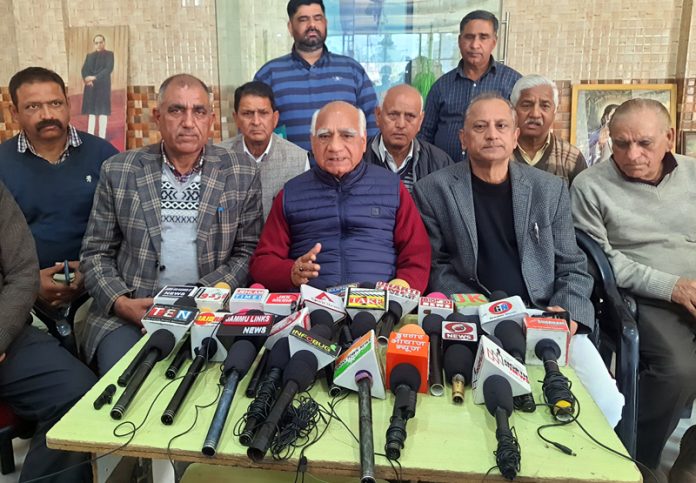 Piran Ditta, president All J&K Guru Ravi Dass Sabha, flanked by others addressing press conference in Jammu on Saturday. - Excelsior/ Rakesh