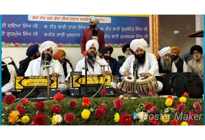 Ragi Jatha from Sri Darbar Sahib Amritsar reciting Shabd Kirtan during Gurmat Samagam at Domana on Sunday.