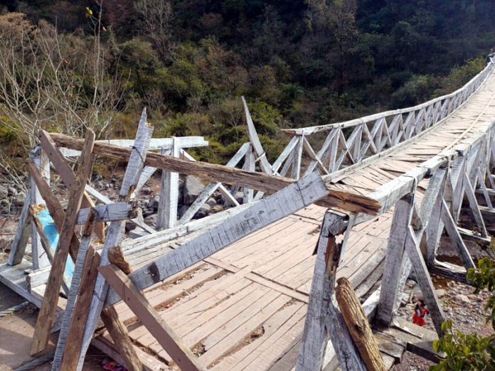 Wooden bridge in Ghordi . - Excelsior/K Kumar