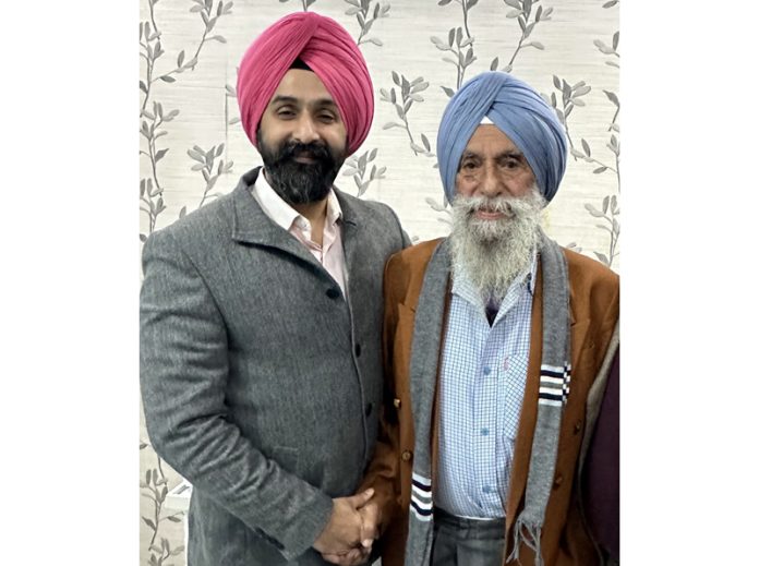Dr Ranjit Singh posing with his patient, Hardit Singh after successfully replacing his both knees with Zero Error Technique on Friday.