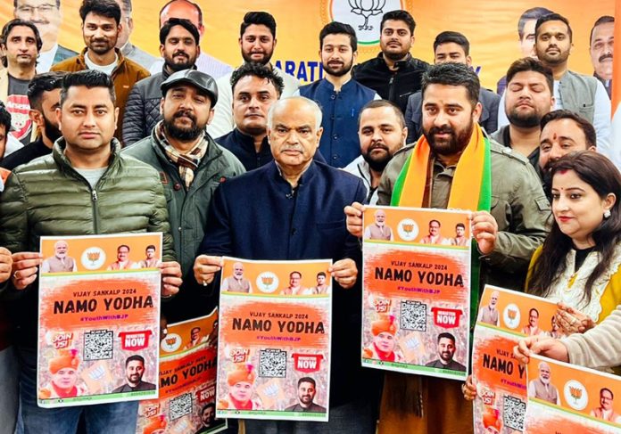 BJP leader Ashok Koul along with others during a function of BJYM in Jammu on Thursday.