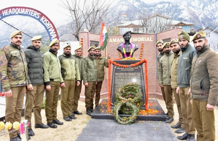 Police officers and officials paying tribute to martyr Dy.SP Aman Thakur on his martyrdom anniversary. - Excelsior/Tilak Raj