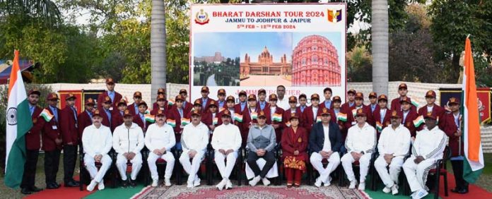 Inspector General D K Boora, Jammu Frontier BSF along with the children during flag off ceremony of 'Bharat Darshan' tour in Jammu on Monday.