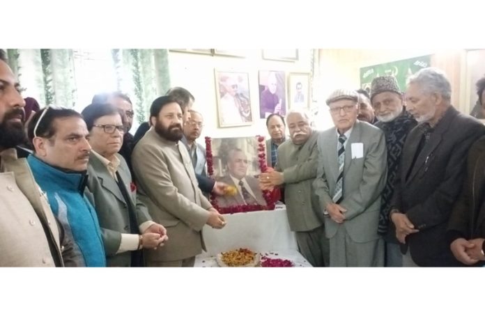 Tribute being paid to Late Sheikh Nazir by NC leaders during function in Jammu.