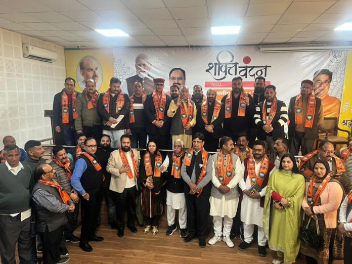BJP leaders during State Election Committee’s Social Sampark meeting posing for a photograph at Jammu on Saturday.