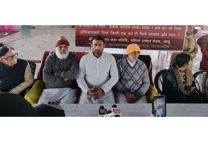 Followers of Sant Shri Asaram Bapu addressing a press conference at Jammu on Sunday.