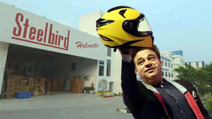Rajeev Kapur, Managing Director of Steelbird Hi-Tech posing with a helmet on Sunday.