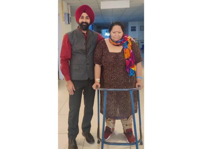 Dr Ranjit Singh with 65-year-old patient Jaspreet Kaur.