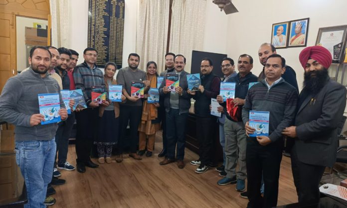 Principal GGM Science College, Dr. Rajesh Gupta along with others releasing three books at Jammu on Thursday.