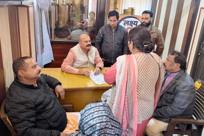 BJP vice president Yudhvir Sethi listening public grievances at Kacchi Chawni office on Thursday.