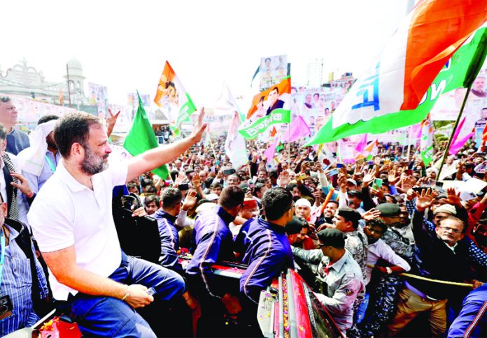 Congress leader Rahul Gandhi waving supporters during Bharat Jodo Nyay Yatra, in Unnao in Uttar Pradesh on Wednesday. (UNI)