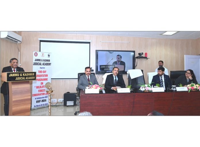 Justice Sanjeev Kumar addressing orientation programme at Judicial Academy.