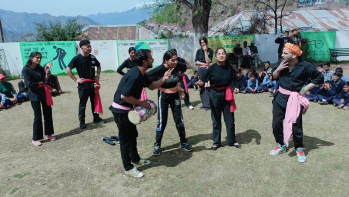 A scene from the Nukkad Natak 'Aao Vote Karen Sab' staged at Mahore.