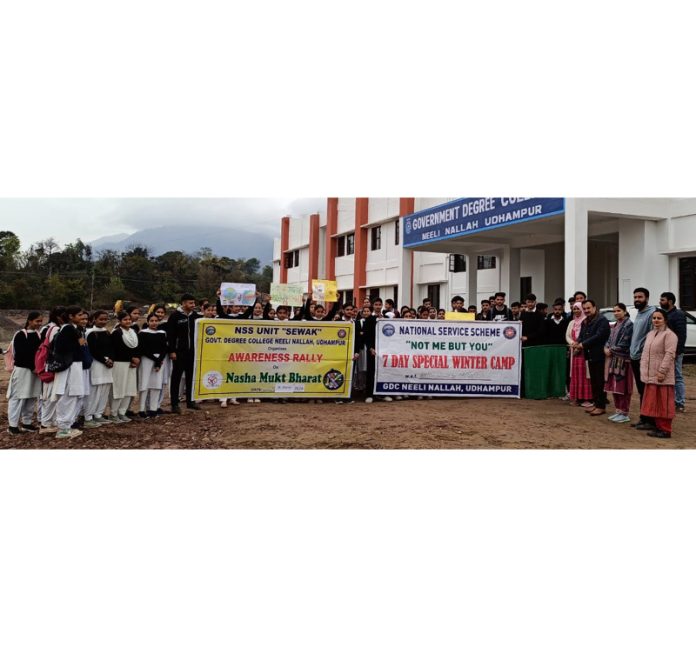 Students of GDC Neeli Nallah, Udhampur posing along with banners of Nasha Mukt Bharat' during an awareness rally on Tuesday.
