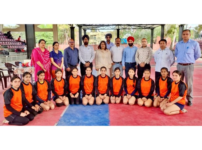 Chief spokesperson of BJP Mahila Morcha J&K, Ritika Trehan and other guests posing with Kabaddi players.