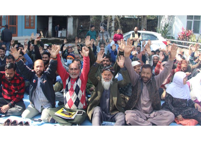 Kashmiri Muslim, Sikh and Pandit migrants staging protest in front of office of the Commissioner, Relief and Rehabilitation in Jammu.