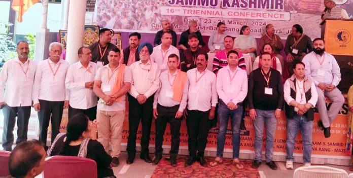 BMS J&K leaders posing for a group photograph during triennial conference at Katra on Sunday.