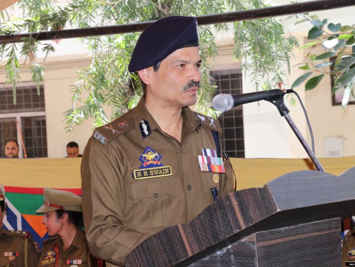 DGP RR Swain addressing a gathering of women police personnel at Gulshan Ground Jammu on Thursday.