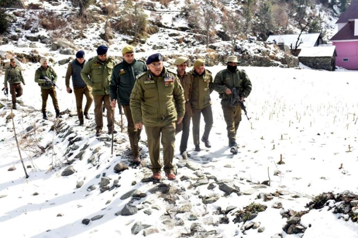 ADGP Jammu, accompanied by other police officers and personnel, in Poonch on Monday.