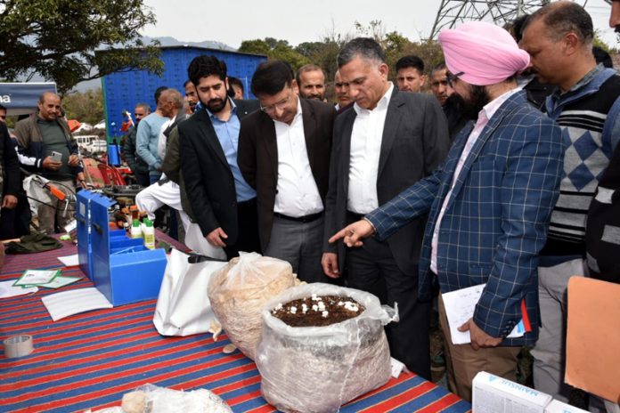 Secretary Disaster Management, Relief, Rehabilitation and Reconstruction Anil Koul inspecting a stall.