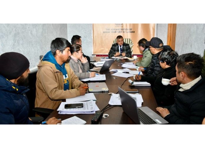 Amit Sharma chairing a meeting of stakeholders in Leh on Monday.