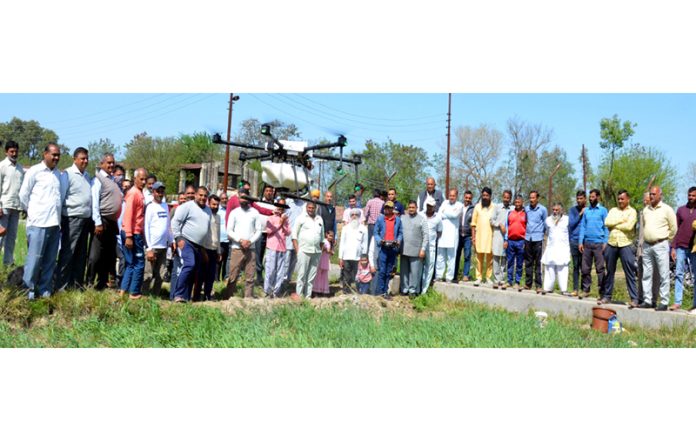 Scientists of SKUAST-Jammu demonstrating Agri-Drone near Indo-Pak border in R S Pura.